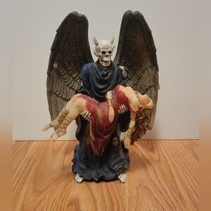 Winged Death holding a woman